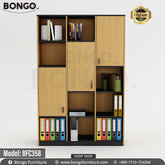 A tall wooden file cabinet with multiple drawers and shelves, fully stocked with files and office supplies, and a label at the top left corner indicating the model number BFC358.